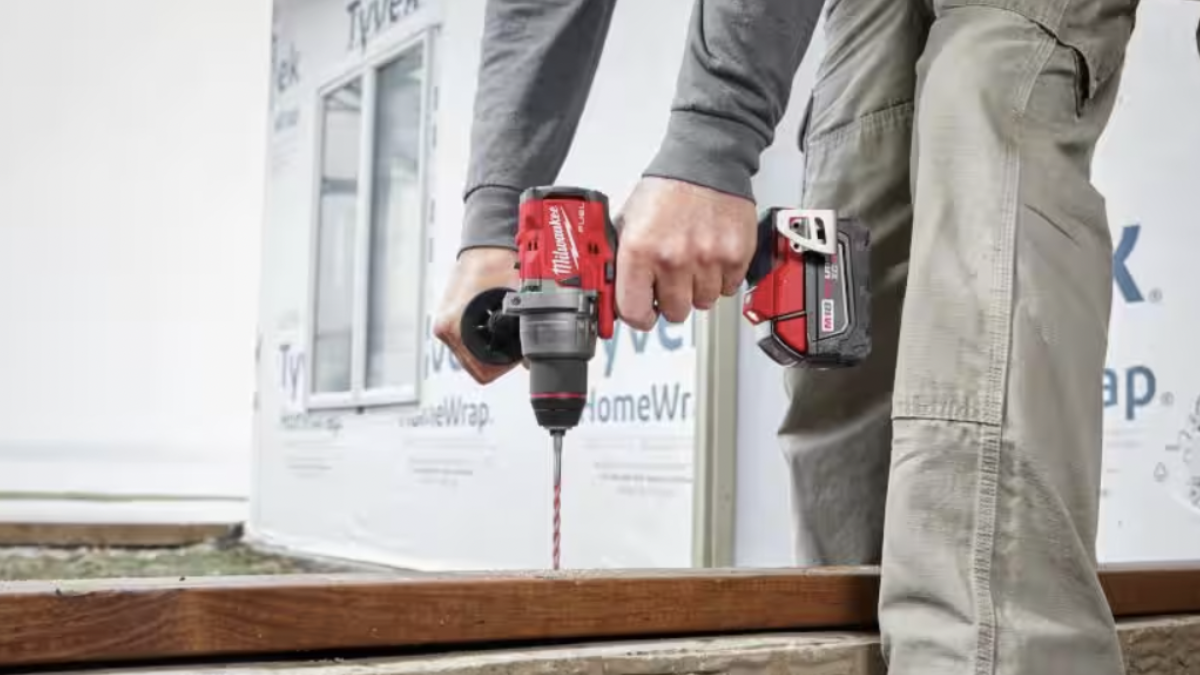Man using Milwaukee Fuel Cordless Hammer Drill/Driver on construction site