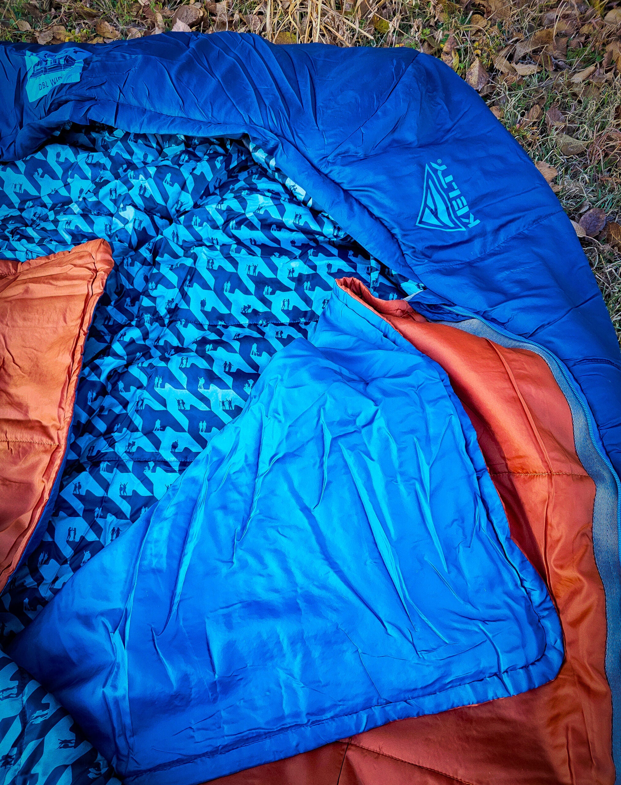 Kelty Tru.Comfort Doublewide Sleeping Bag spread out on ground
