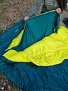 Female camper spreading out Nemo Jazz Duo Double Sleeping Bag