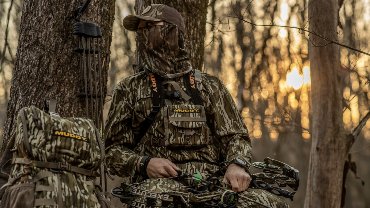 Hunter wearing Muddy Outdoors gear sitting in tree stand