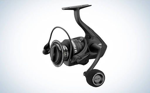 13 fishing AL13 spinning reel on blue and white background