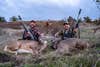 Two hunter pose with a pair of Columbian whitetail deer, taken in western Oregon