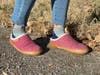 Woman wearing Manitobah Renew Clog Slippers outside