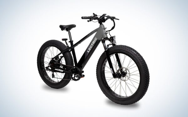 A grey and black Lectric X-Peak ebike on a black and white gradient background.