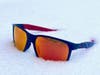 Oakley Holbrook sunglasses sitting in snow