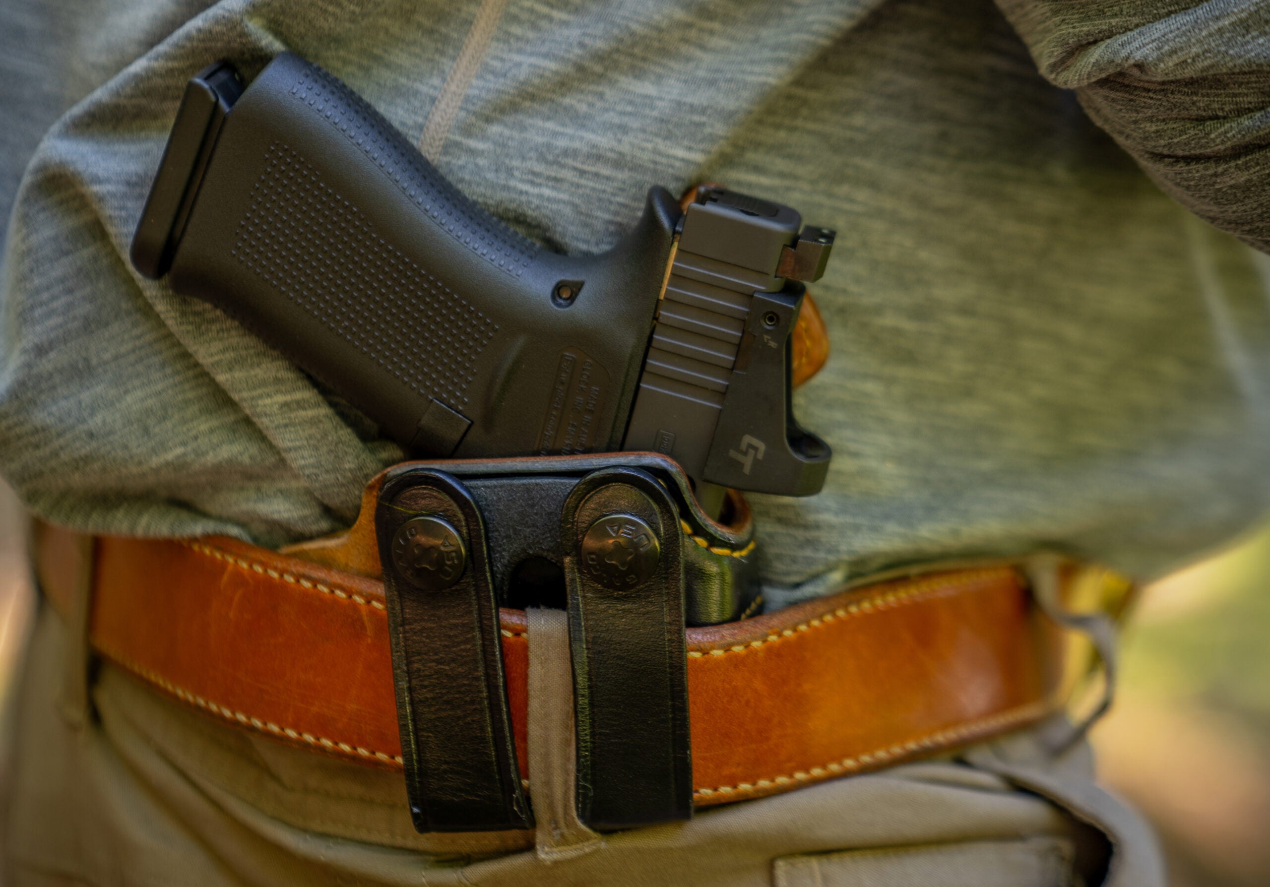 Photo of a 9mm Luger pistol in a concealed carry holster