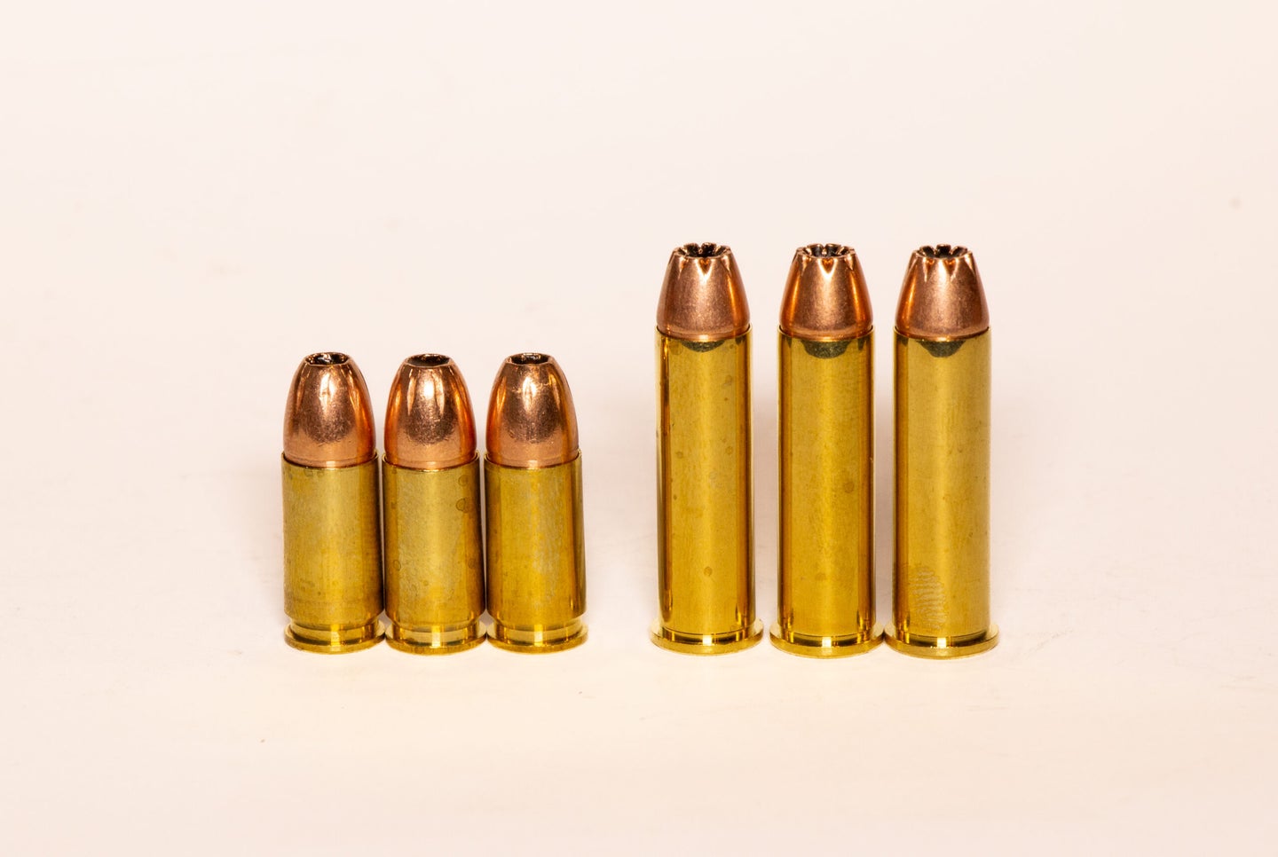 Photo of .357 Magnum and 9mm Luger cartridges side by side