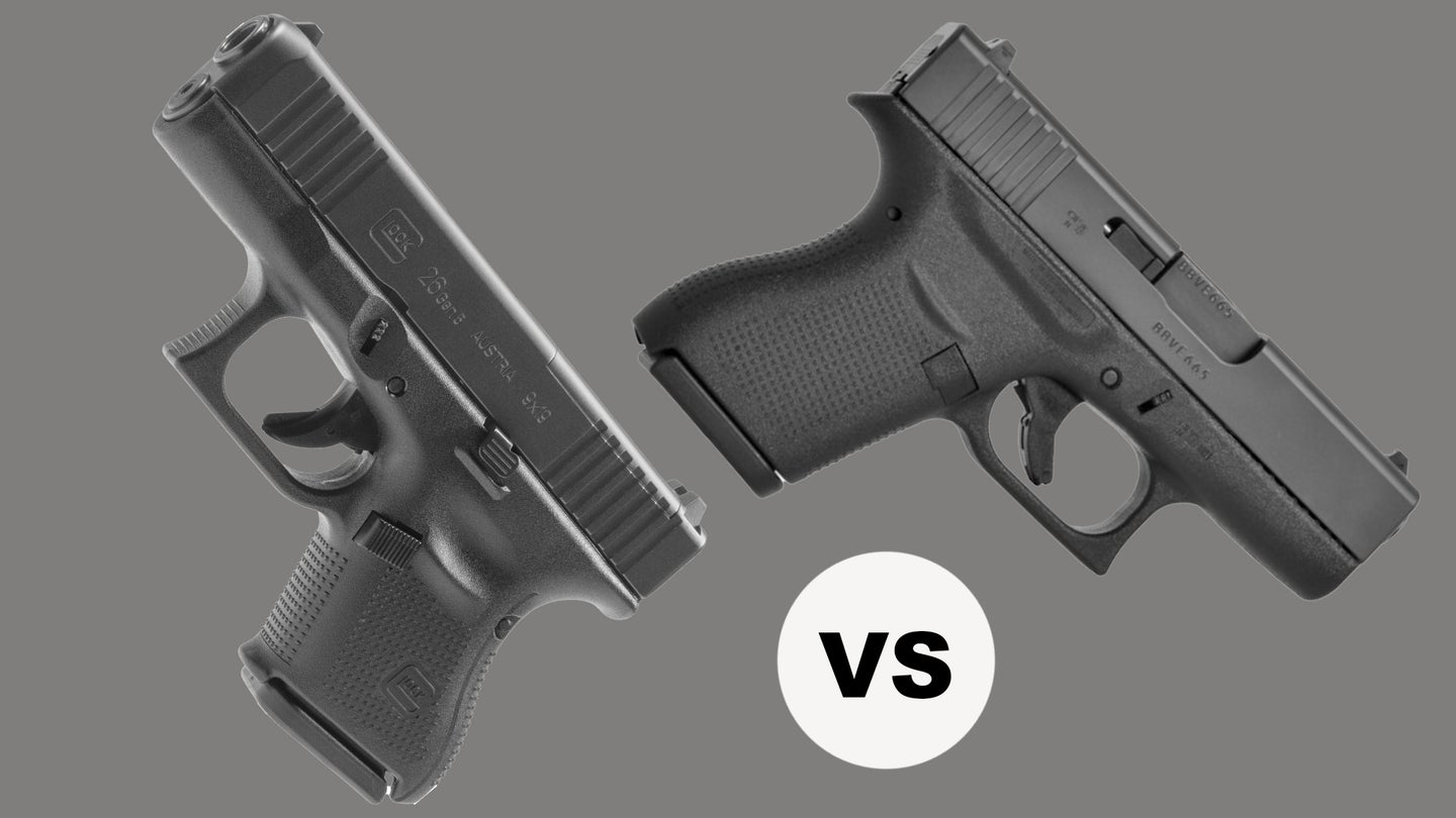 Glock 26 pistol on the left; Glock 43 pistol on the right, both on against a gray backgroudn