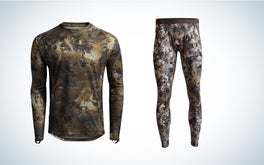 The camo Sitka Core baselayer top and bottom isolated on a black and white background.