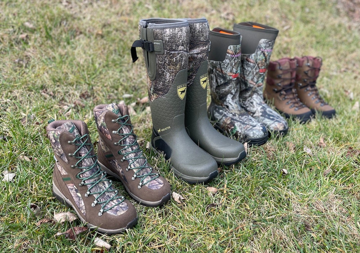 Women's hunting boots from Danner, Irish Setter, LaCrosse, and Kenetrek lined up in grass