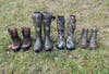 Women's hunting boots from Danner, Irish Setter, LaCrosse, and Kenetrek lined up in grass 