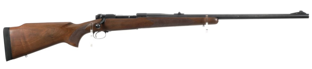 A Winchester Model 70 bolt-action rifle on white background