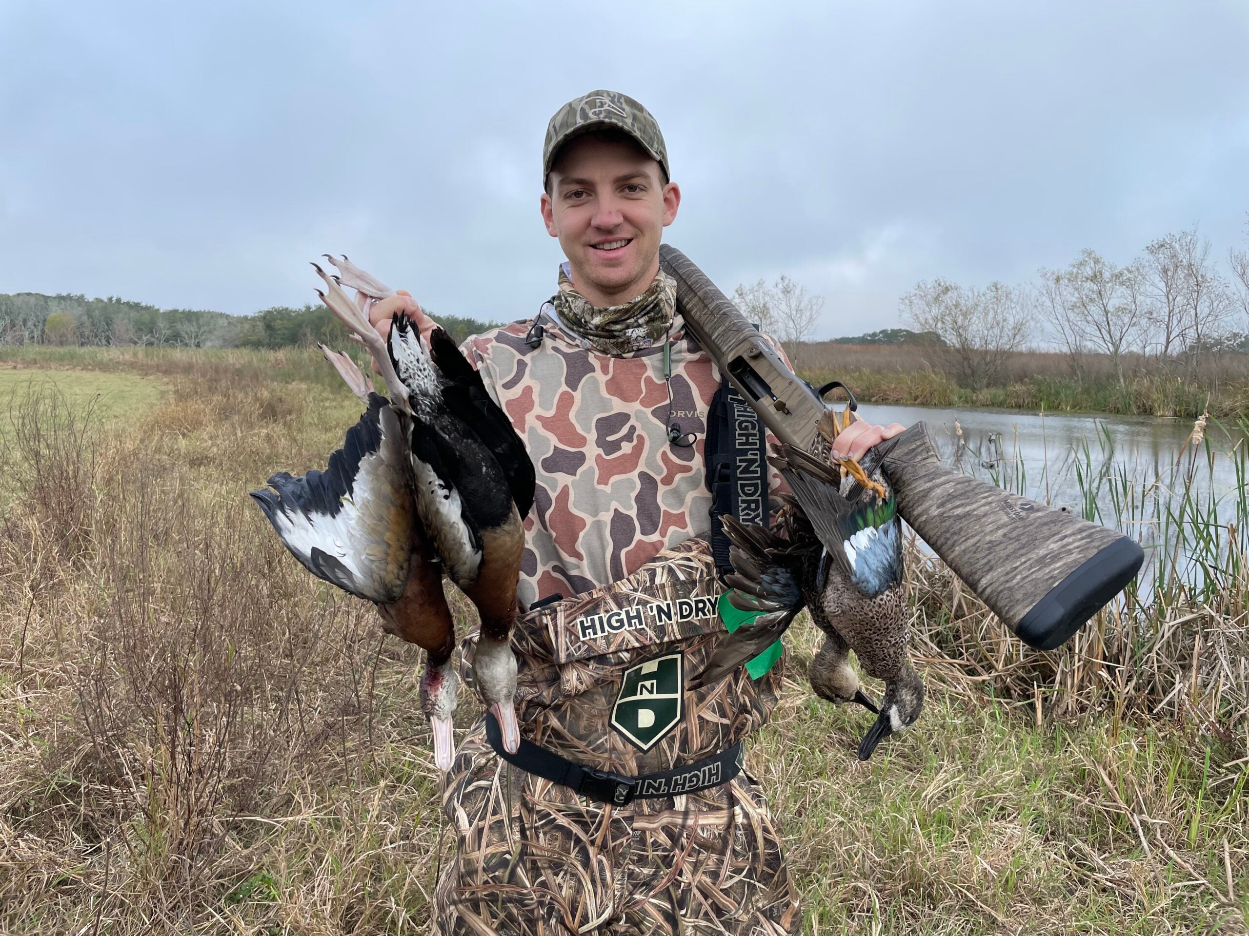 Field & Stream Senior Editor, Ryan Chelius with a pair of black-bellied whistling ducks and a pair of blue-winged teal.
