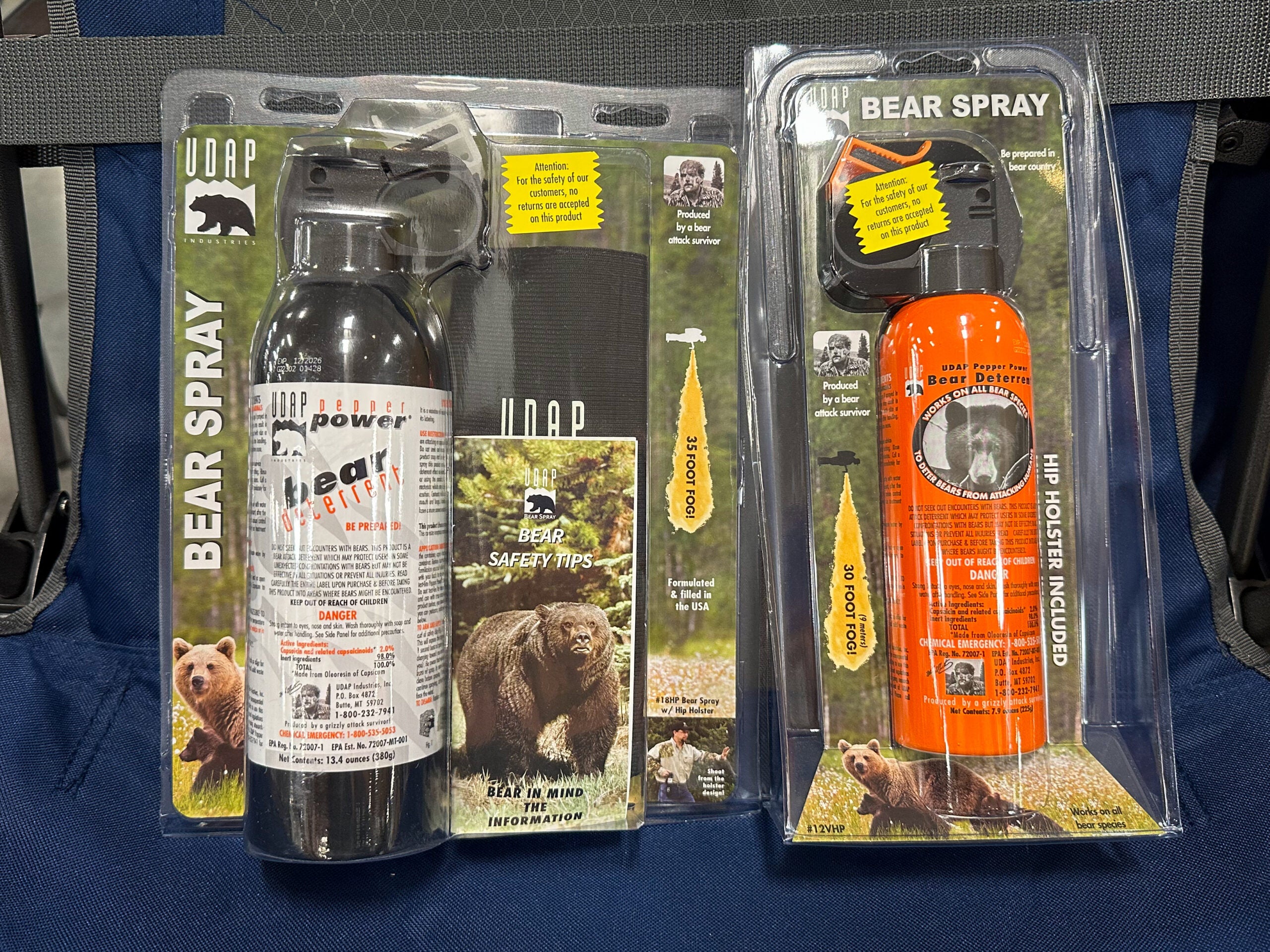 Packages of bear spray on a table