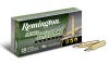 Box of Remington 7mm Rem Mag ammo and two loose cartridges on white background