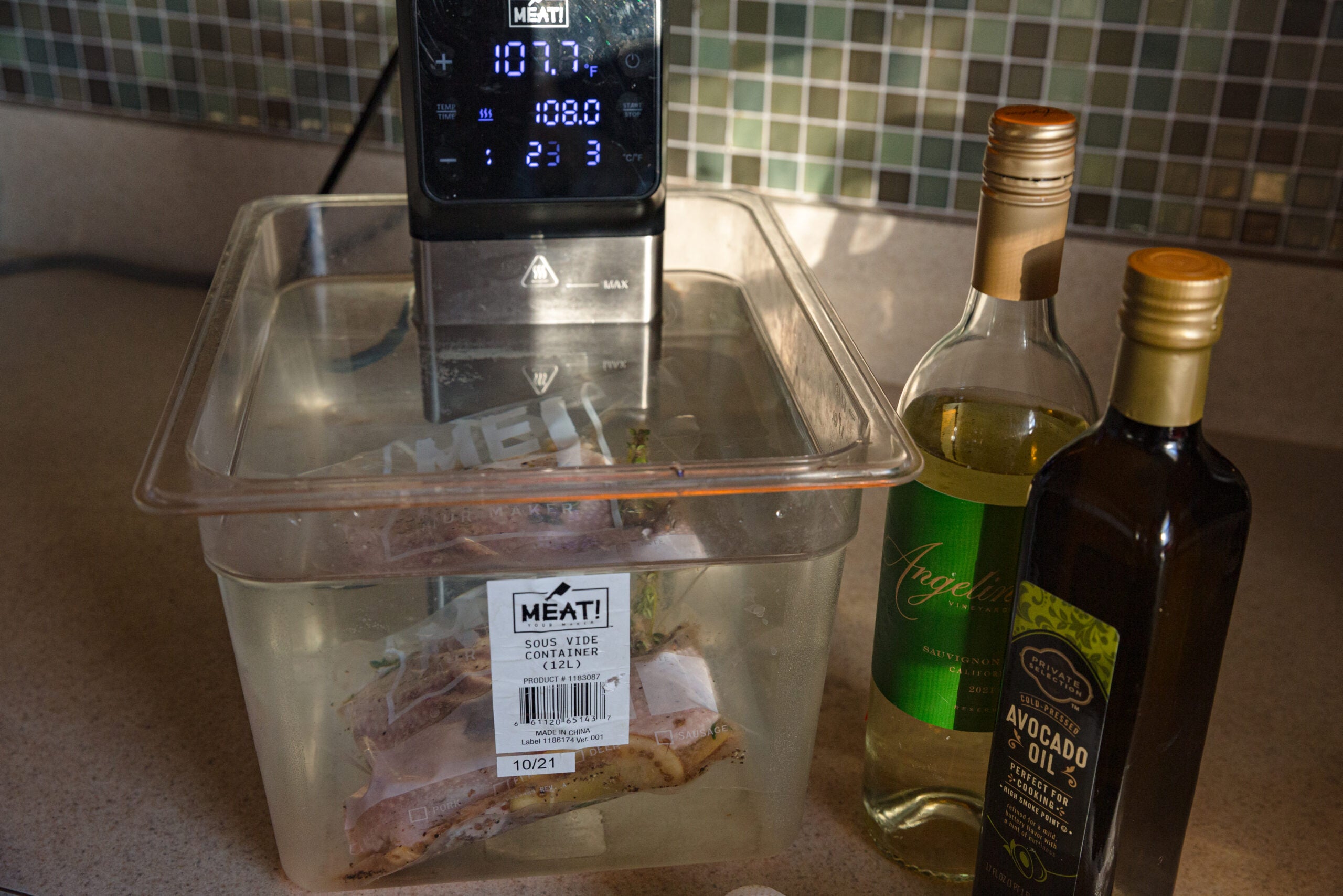 Goose legs cooking in a sous vide water bath