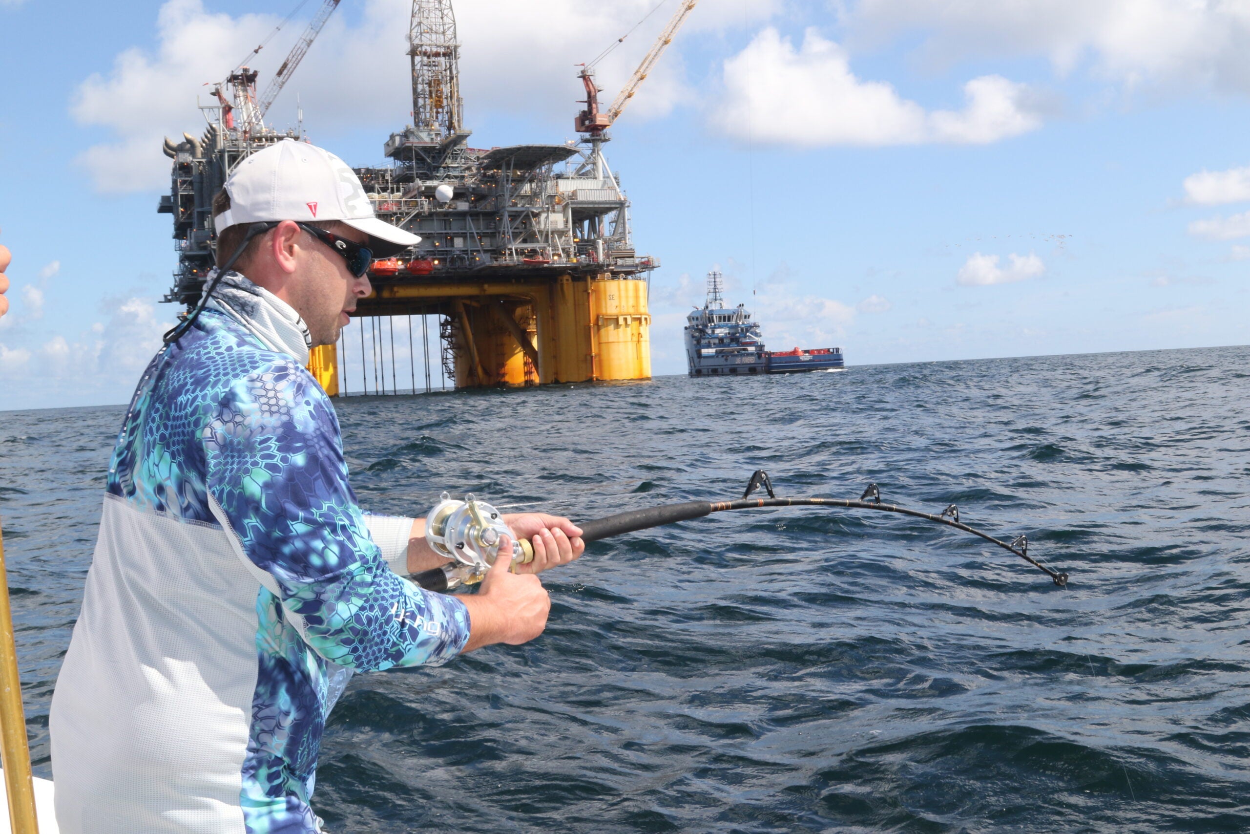 yellowfin tuna fishing next to oil rig