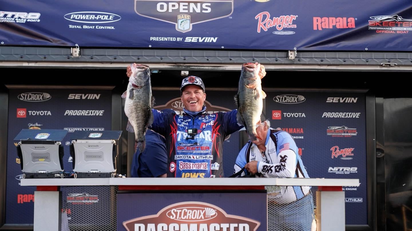 Scott Martin with two big largemouth bass at a tournament weigh-in.