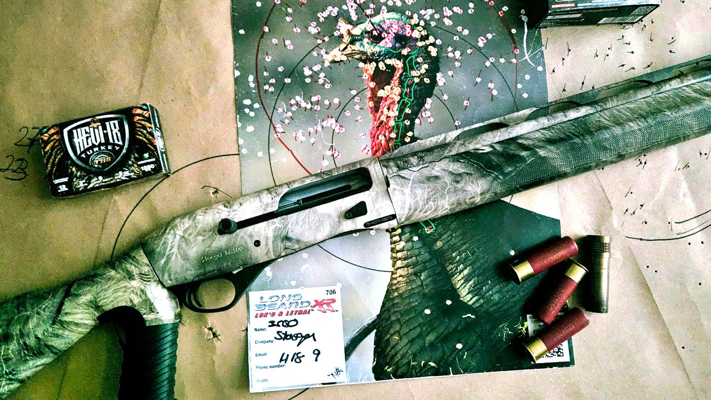 Stoeger 3500 Predator/Turkey shotgun on patterning target with ammo and choke.