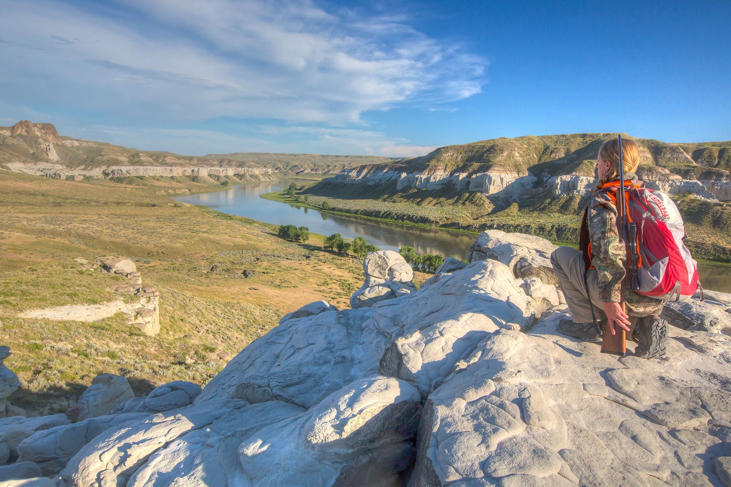 A hunter glasses for big game on BLM land in Montana's Missouri River Breaks.