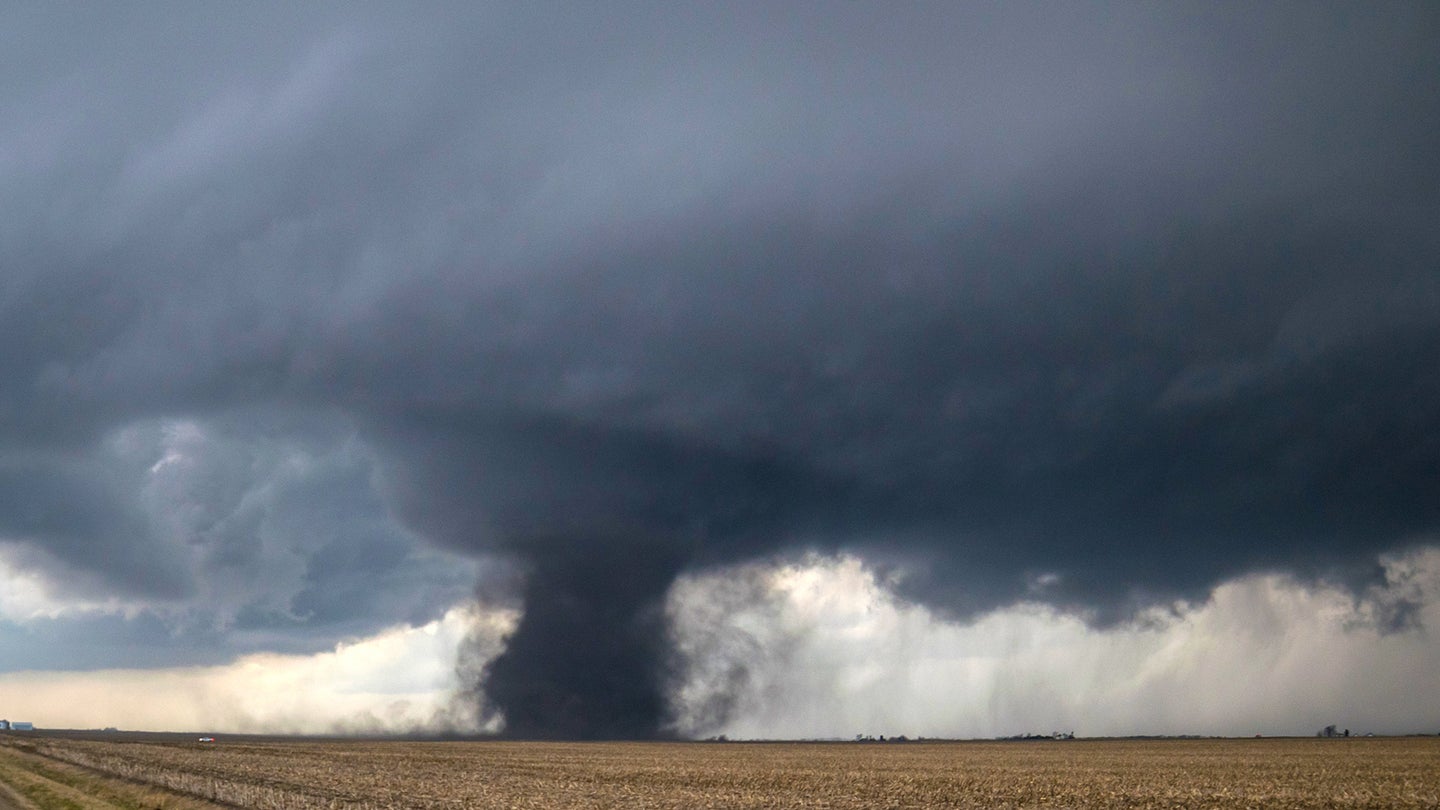 A tornado touches down in a midwestern cornfield