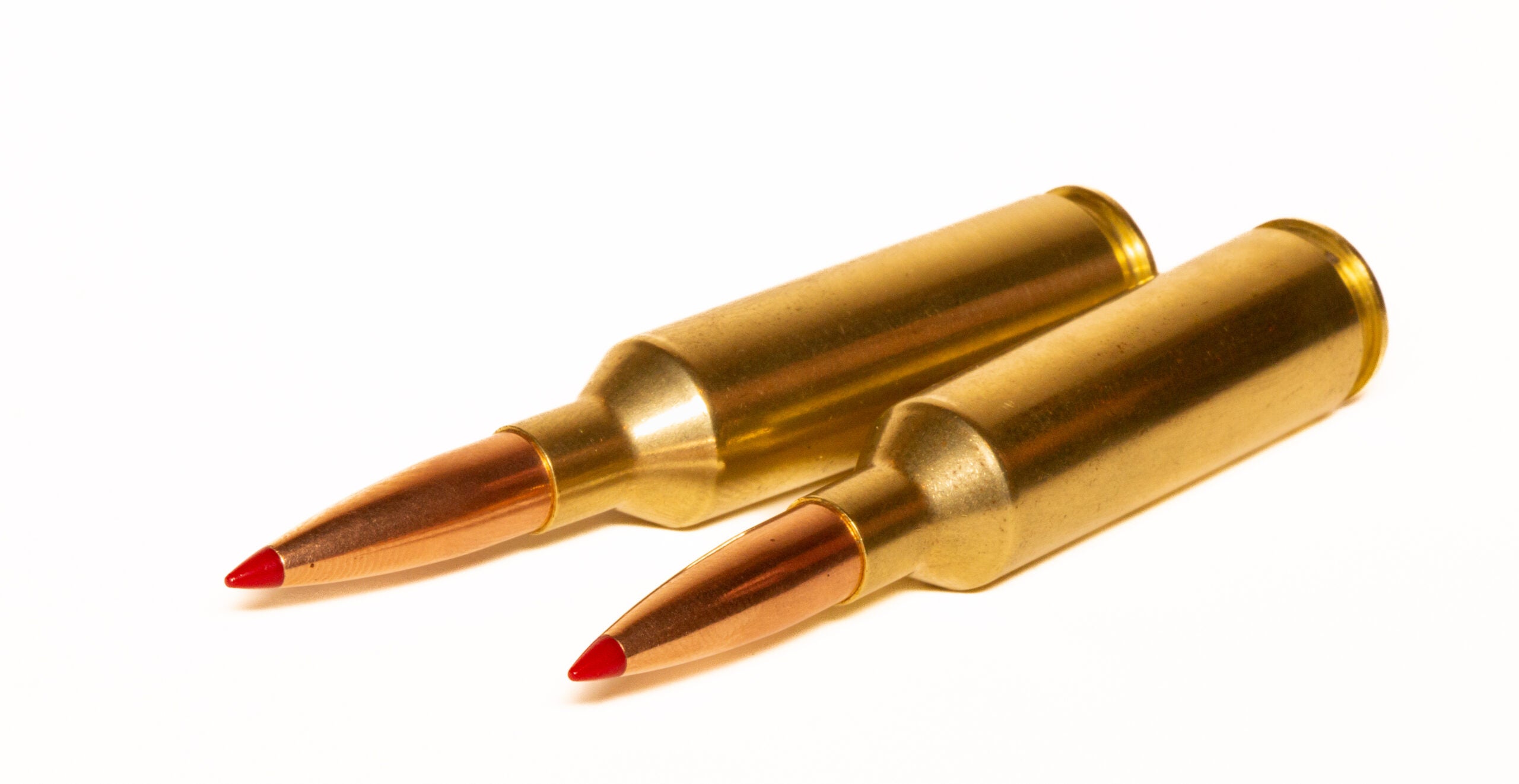 Two Hornady 6.5 PRC cartridges on a white background.