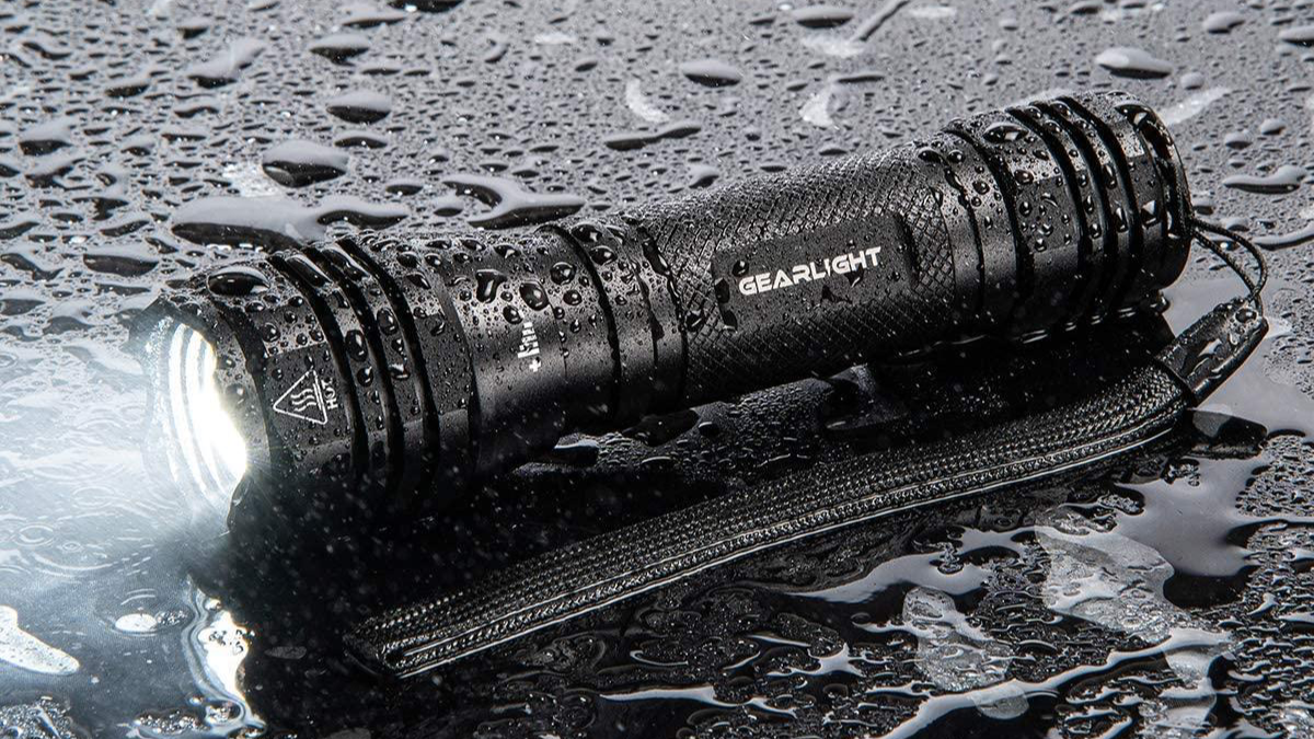 Gearlight S1000 LED Flashlight sitting in rain