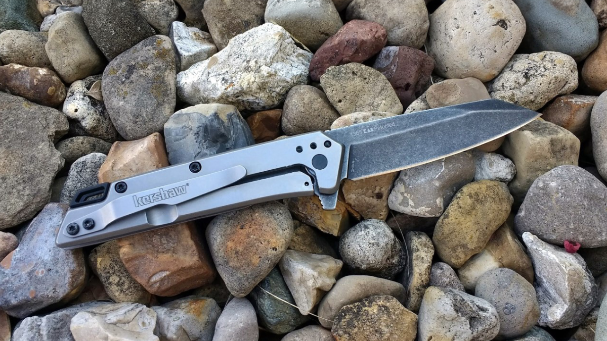 Kershaw Misdirect Folding Knife sitting on rocks